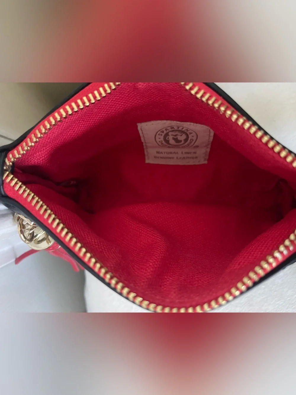 Stylish Black & Cream Geometric Wristlet with Red Accents